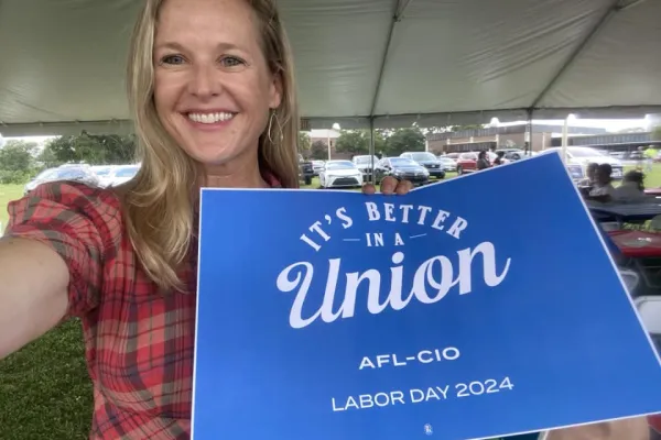 Lindsay Cross with union sign